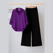 purple button down shirt with black flapper