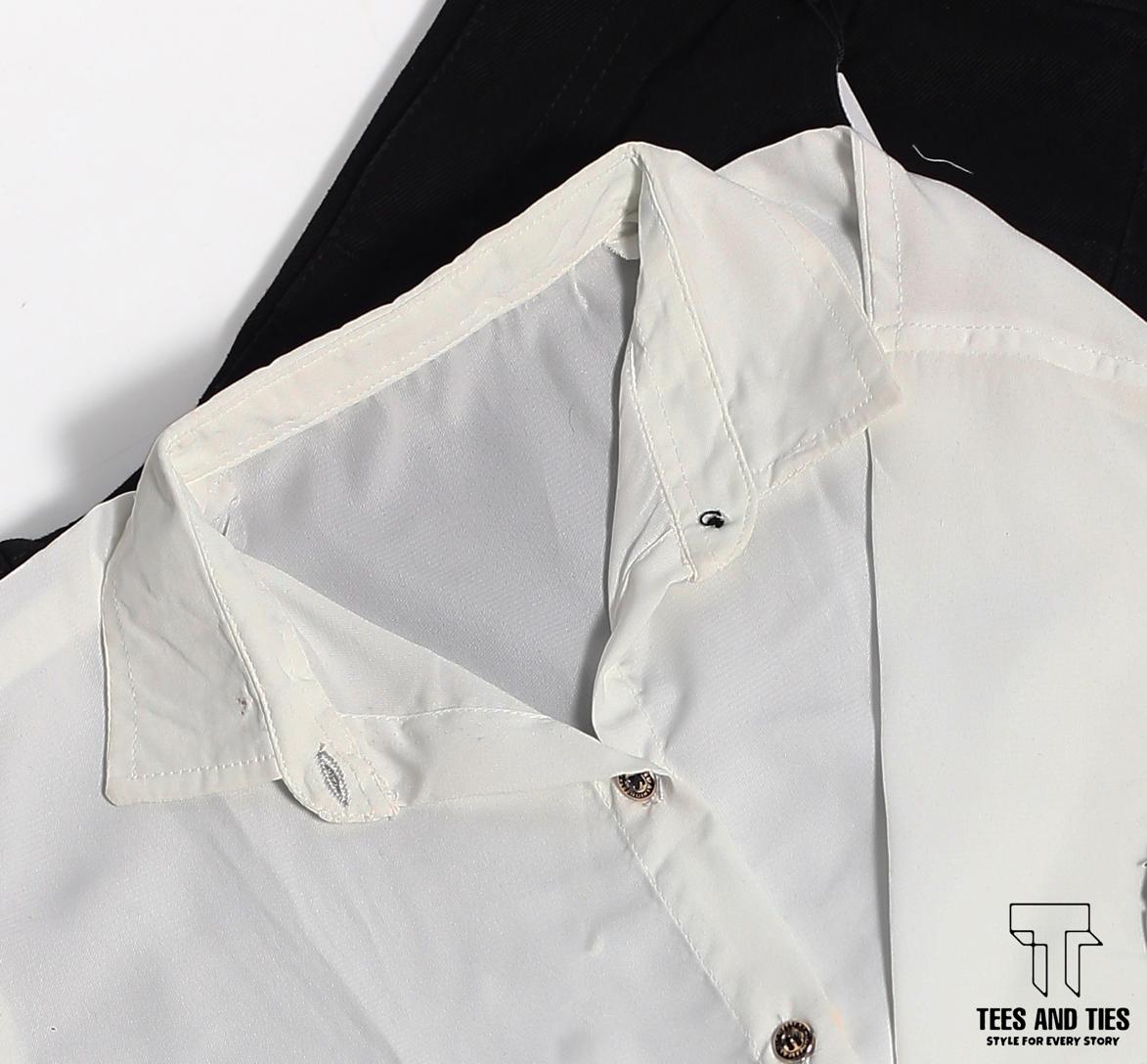 White button down with black wide leg pant and black camisole