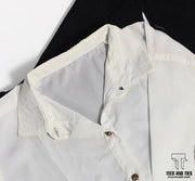 White button down with black wide leg pant and black camisole
