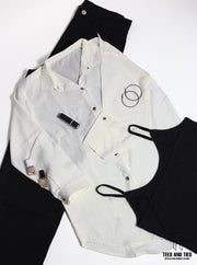 White button down with black wide leg pant and black camisole