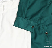 Green button down with white inner camisole and white wide leg jeans