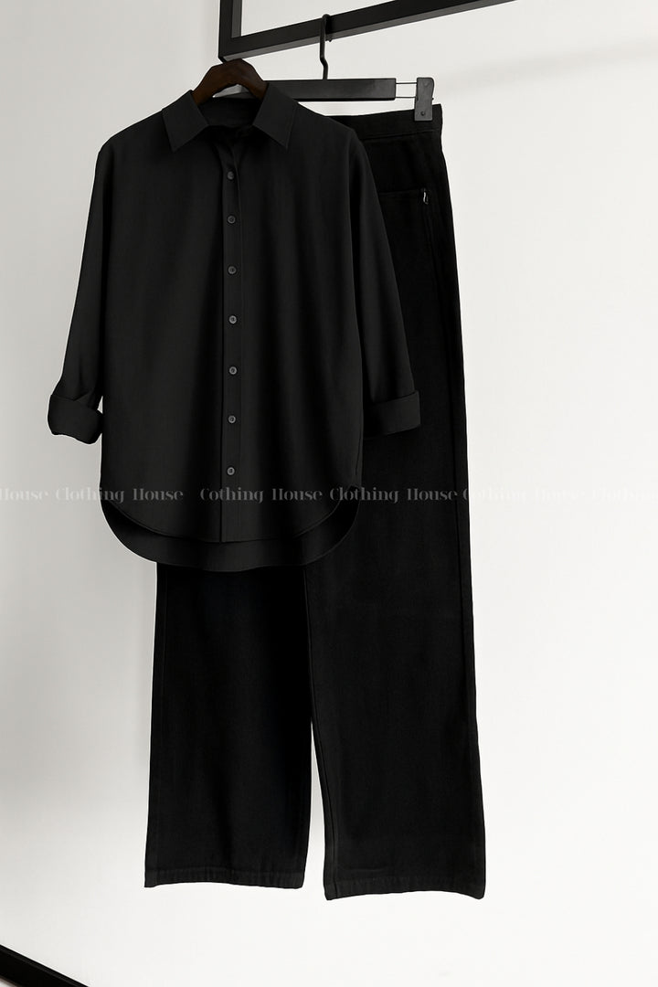 Black button down shirt with black wide leg jeans