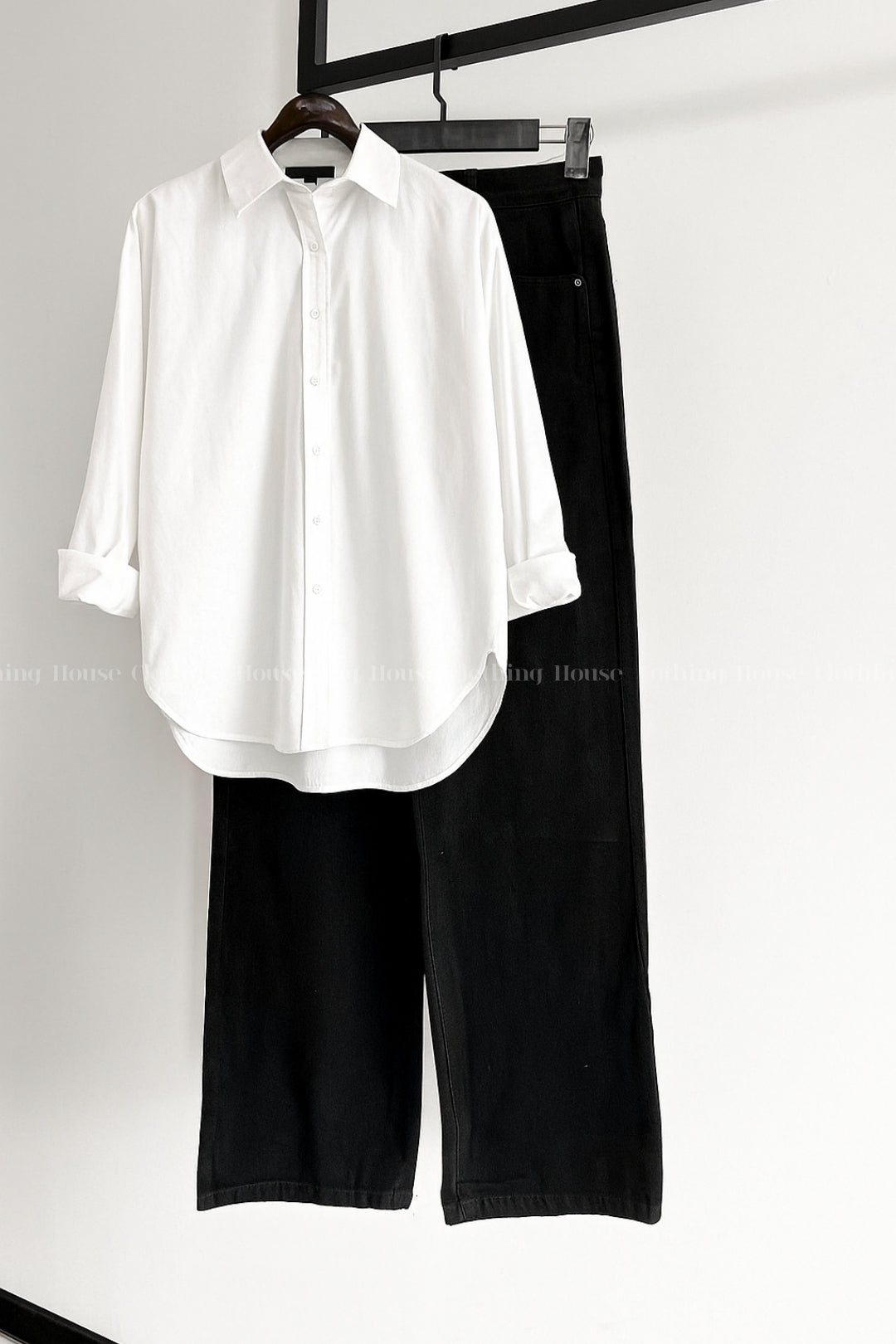 White button down shirt with black wide leg jeans