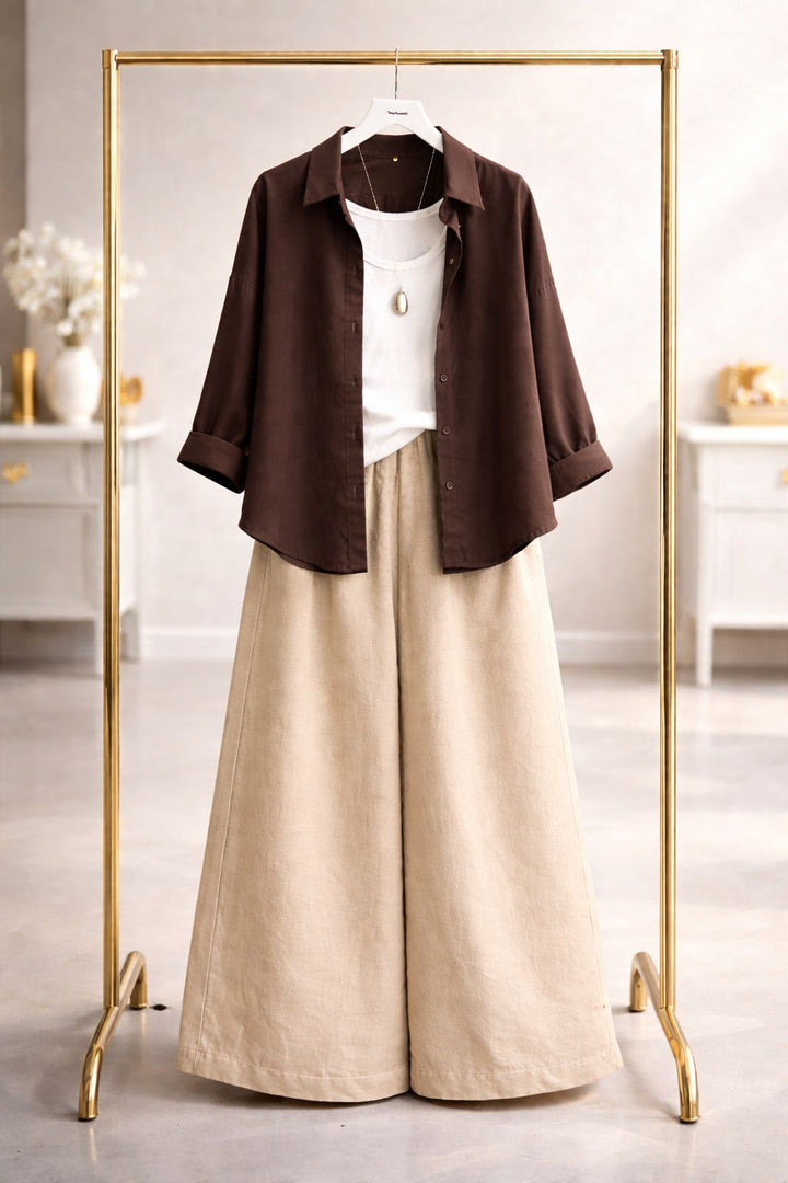 Brown button down with beige flapper trouser and white camisole