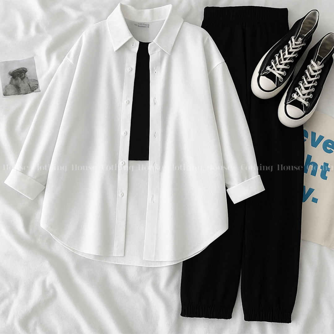 White button down shirt with black trouser and black camisole