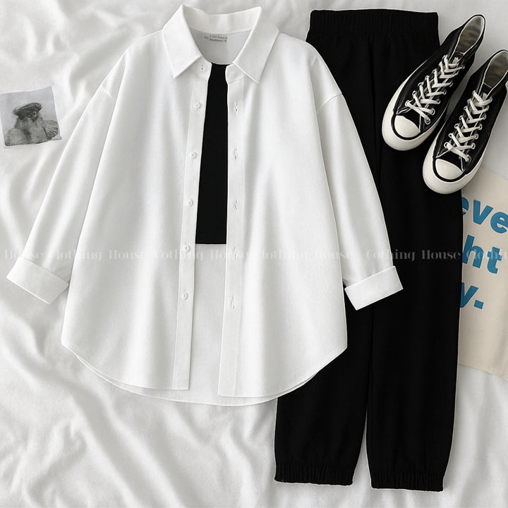 White button down shirt with black trouser and black camisole
