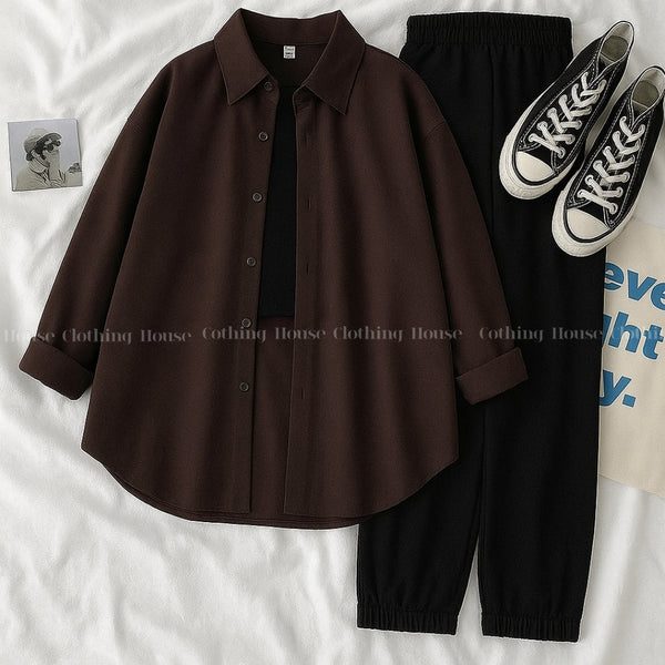 Dark brown button down shirt with black trouser and black camisole