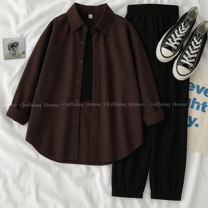 Dark brown button down shirt with black trouser and black camisole