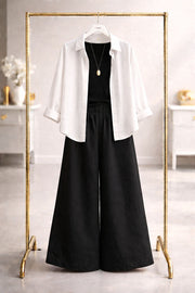 White button down with black flapper trouser and black camisole