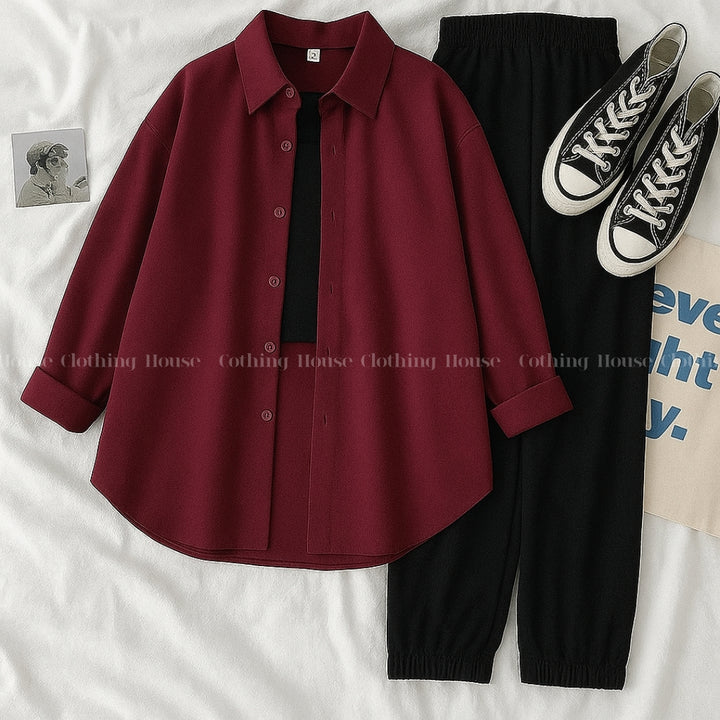 Maroon button down shirt with black trouser and black camisole
