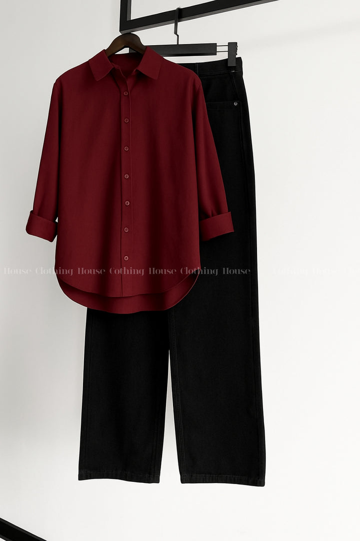 Maroon button down shirt with black wide leg jeans