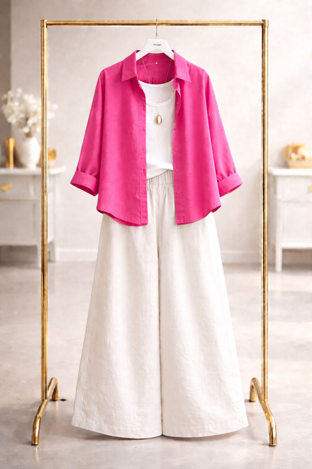 Shocking pink button down with white flapper trouser