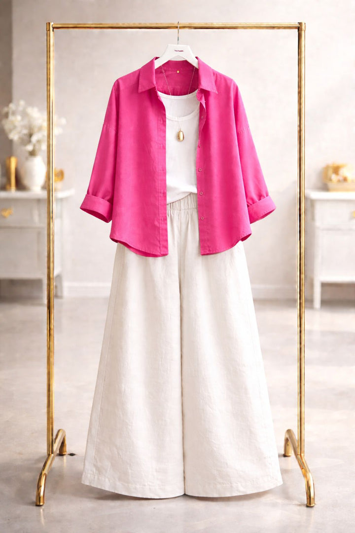 Shocking pink button down with white flapper trouser